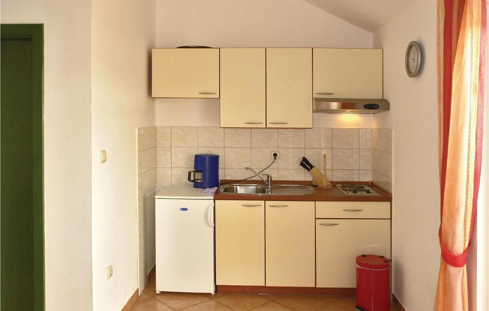 Gorgeous Apartment In Malinska With Kitchen Exterior photo